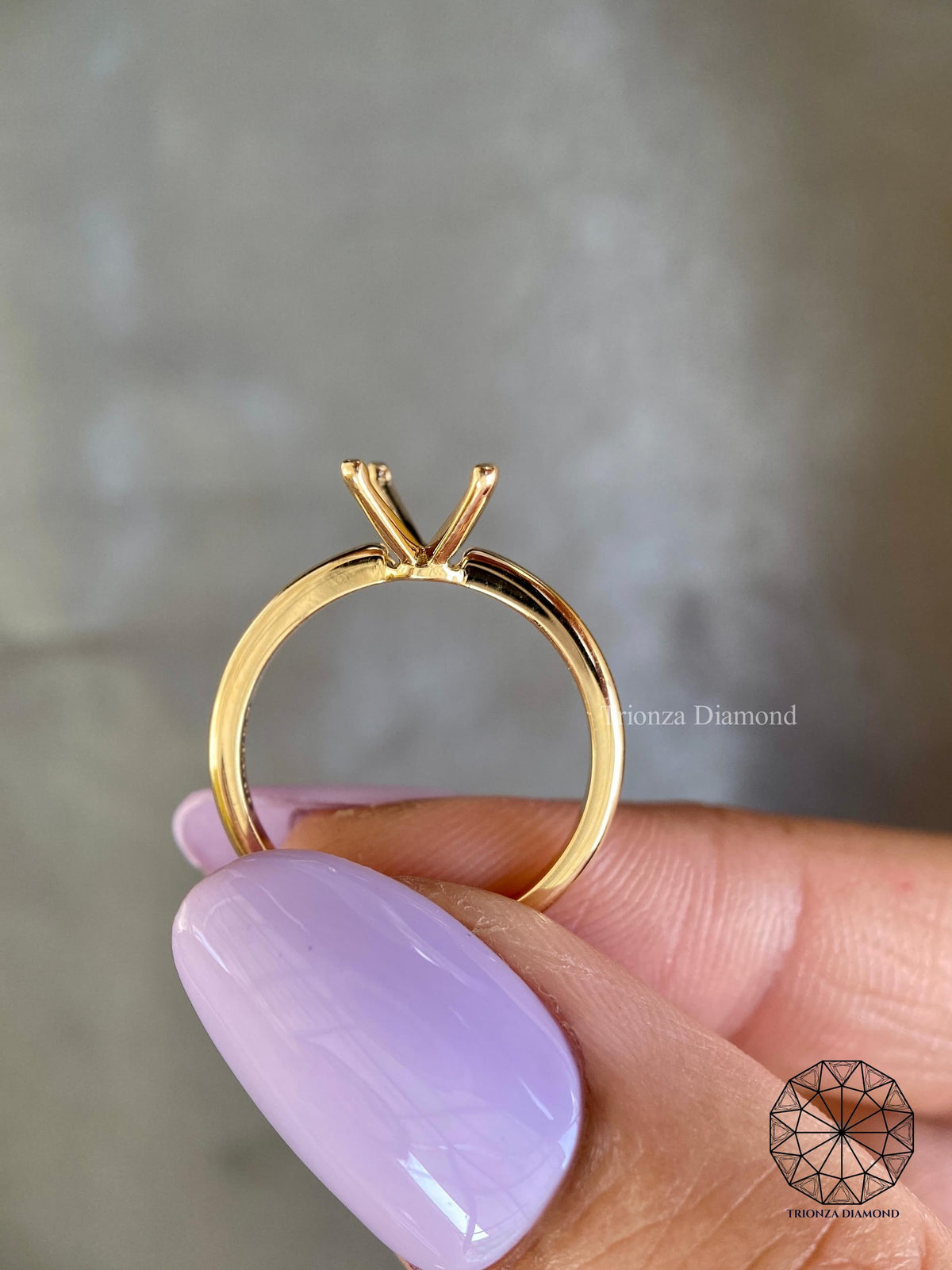 Close-up of the 4 prong setting crafted to securely hold your chosen diamond