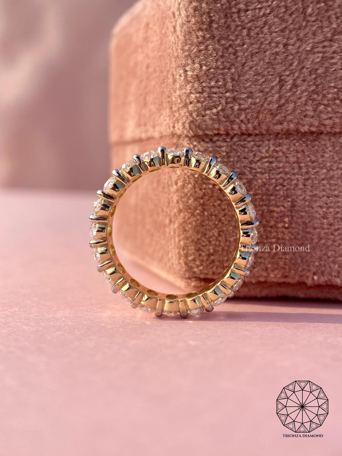 TrionzaDiamond full eternity ring featuring E/F color and VVS/VS clarity diamonds