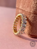 Woman wearing the oval cut lab diamond eternity band on her finger