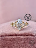 Close-up of the marquise cut lab grown diamond set in a floral branch design