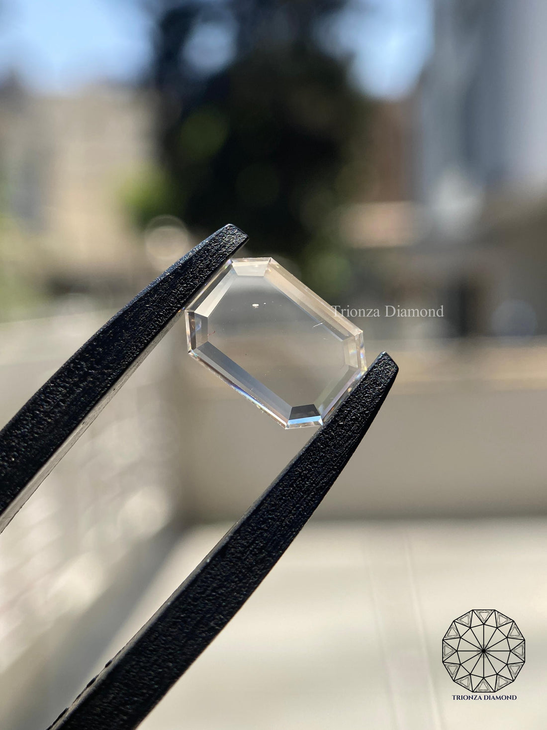 Emerald rose cut lab grown diamond showcasing its geometric facets and transparent brilliance
