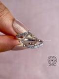 Woman wearing the bypass shank diamond ring showing its unique bridal design
