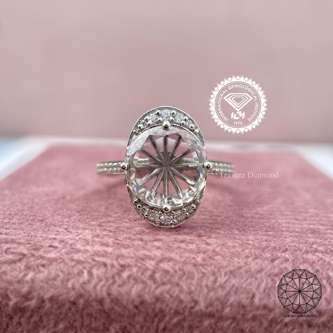 Vintage rose cut diamond engagement ring featuring a halo design with sparkling side stones