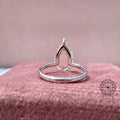 Close-up of the 2.67 CT pear shaped diamond showing its VVS/VS clarity and brilliance