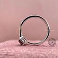 Side view of the solitaire ring highlighting its minimal and modern setting design