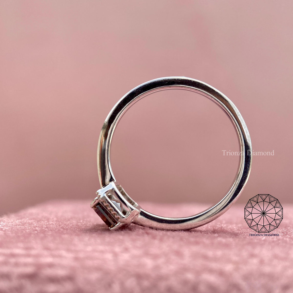 Side view of the solitaire ring highlighting its minimal and modern setting design