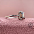 Close-up of the rectangular emerald cut lab grown diamond in a modern bezel setting
