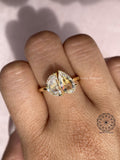 Woman wearing the two stone lab grown diamond ring showcasing its modern elegant design