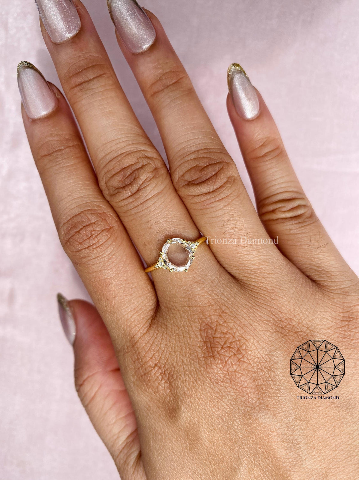 Woman wearing the rose cut diamond engagement ring showing its brilliance on hand