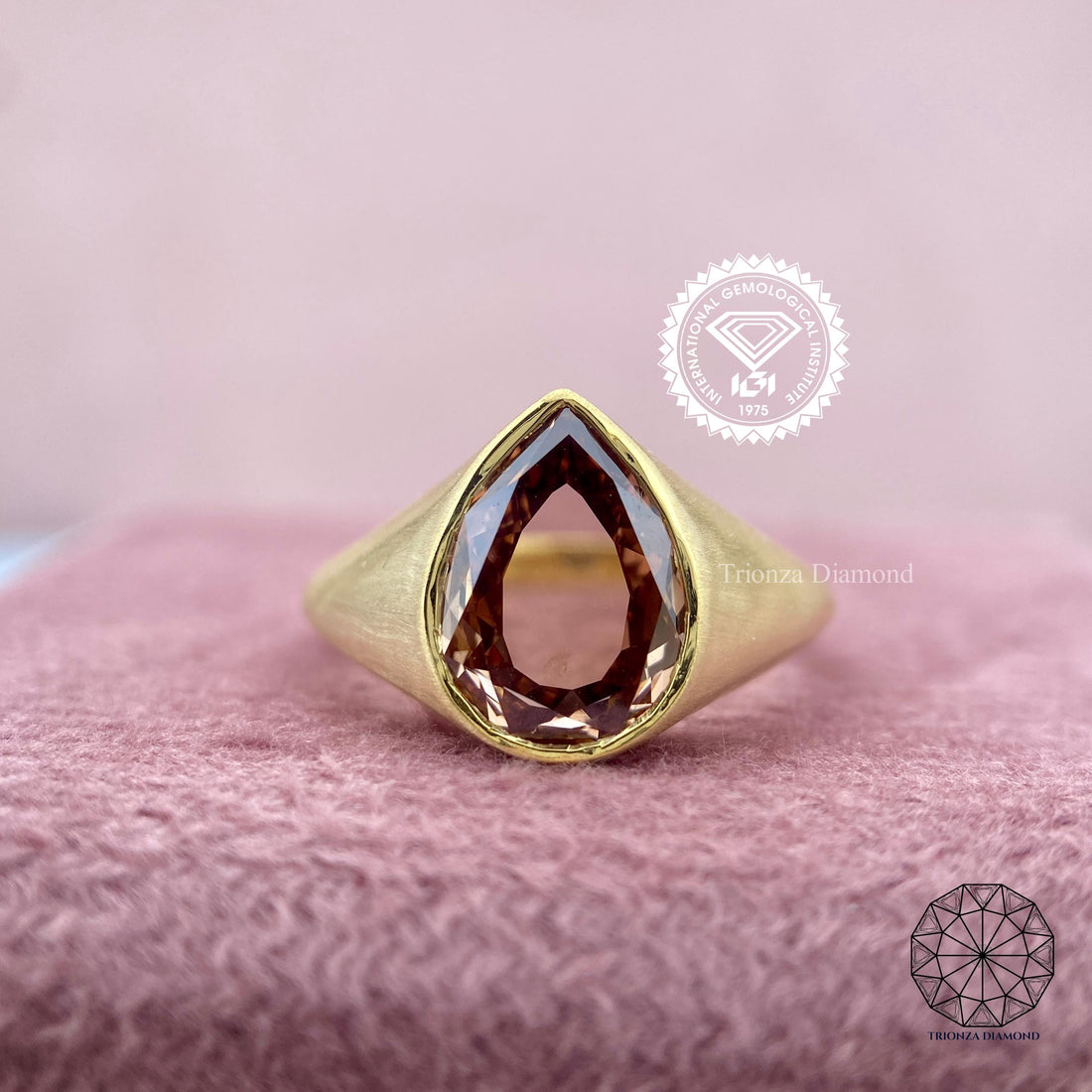 Pear rose cut diamond engagement ring displayed in matte 14K gold bezel setting