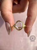 Close-up of the flat cut oval diamond showing its rose cut facets and elegant sparkle