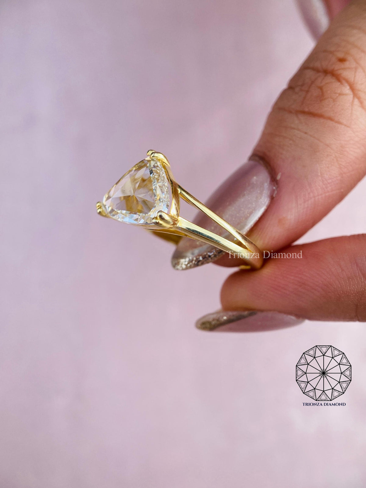 Triangle shaped lab diamond ring set in a modern geometric bridal design