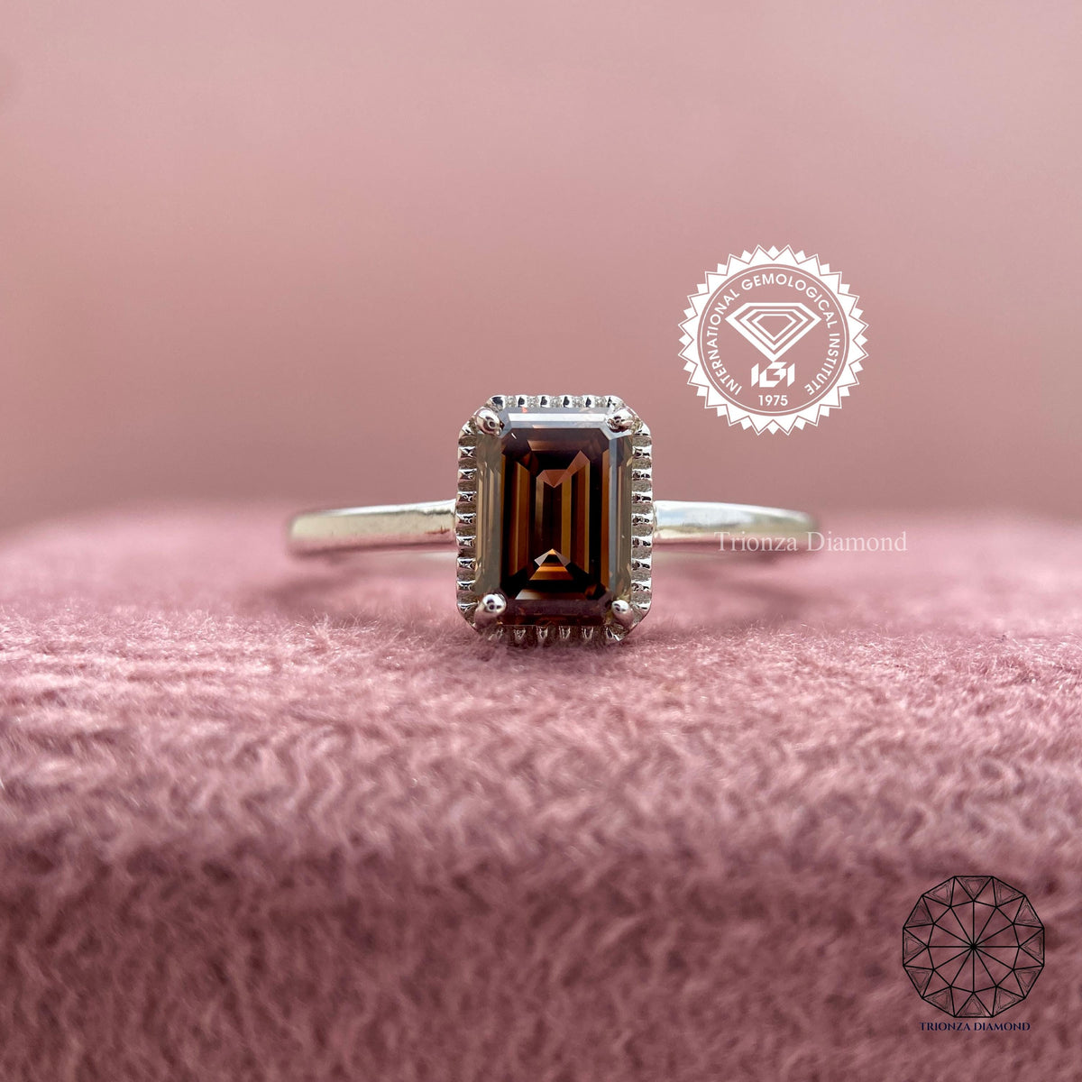 Champagne brown emerald cut diamond ring displayed to show its bezel setting details