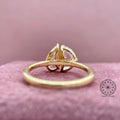 Side view of the Toi et Moi ring highlighting the balance between the two diamond shapes