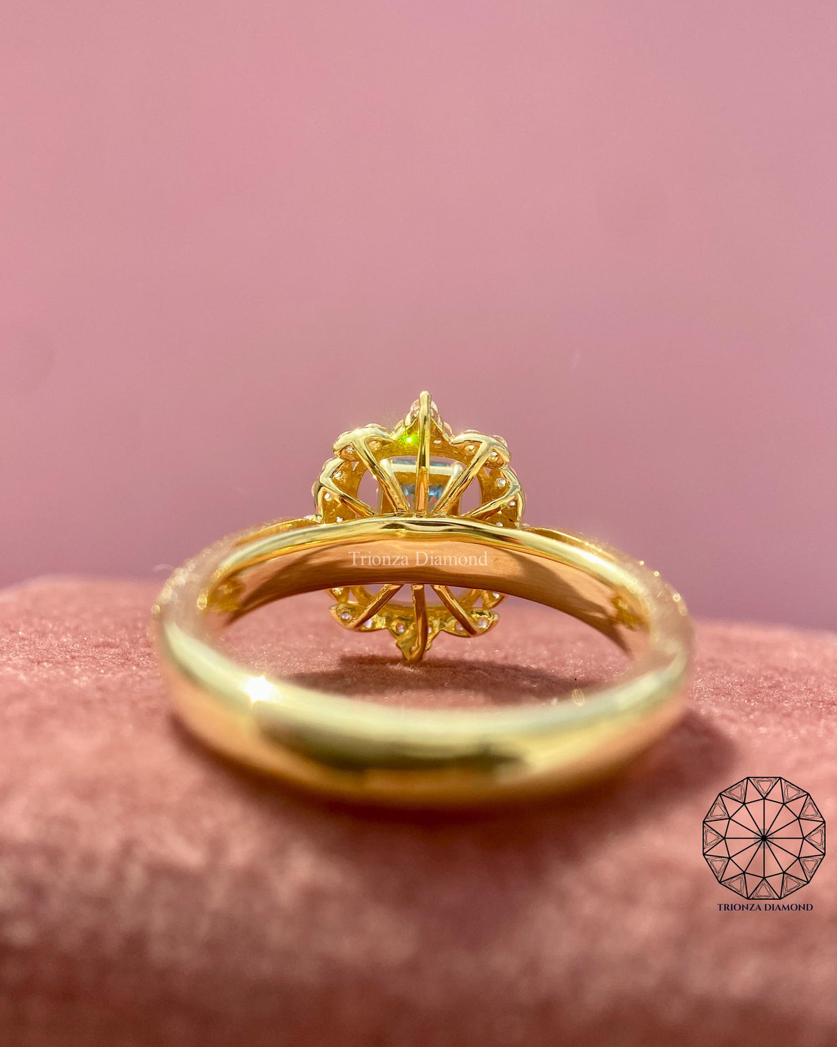 Emerald cut aquamarine style ring presented as an anniversary gift for her