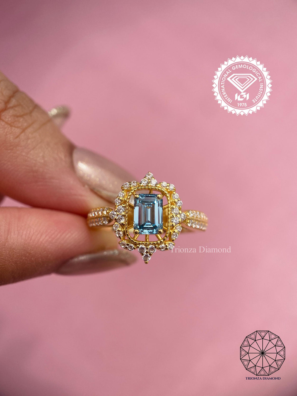 Woman wearing the emerald cut diamond engagement ring, shown up close on her hand