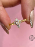Pear cut diamond ring shown from the side to showcase the twisted shank