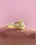 Close-up of the pink pear cut lab grown diamond set in a solid gold art deco ring