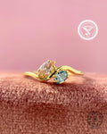 pink and blue diamond ring