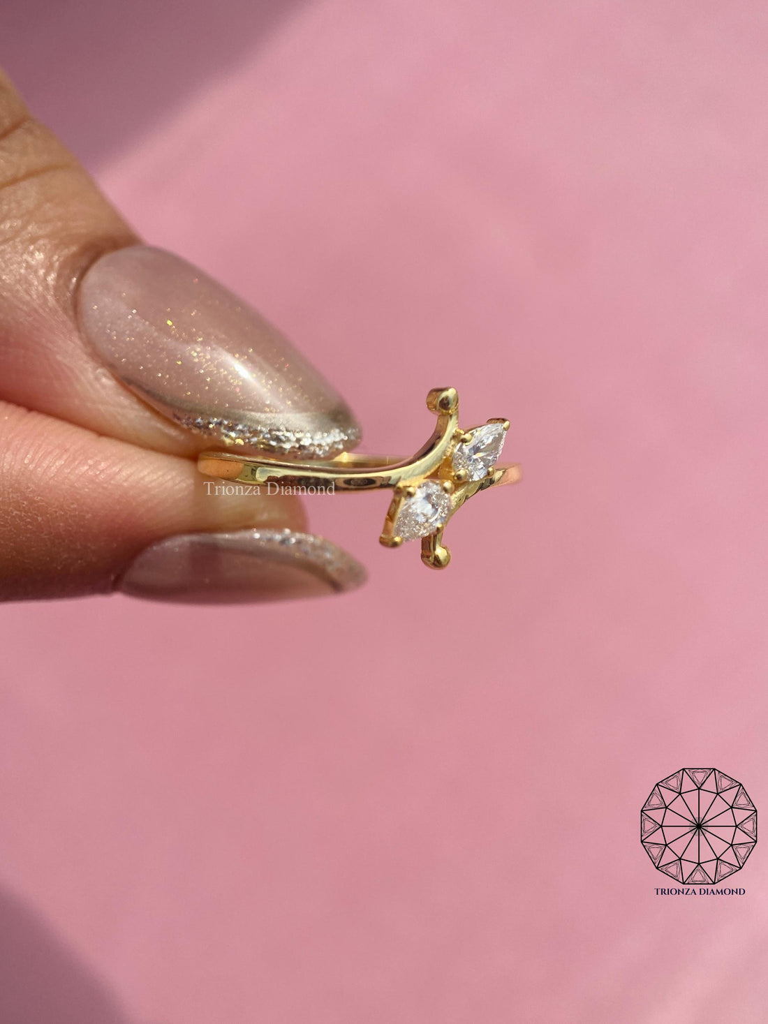 Pear cut toi et moi engagement ring featuring two lab grown diamonds in 14k solid gold