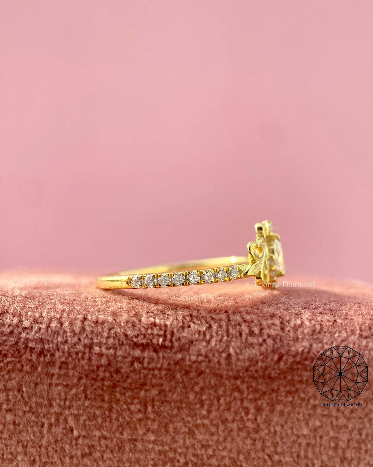 Close-up of the pear cut diamond showing its 0.14 carat brilliance and clarity