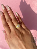Vintage art deco ring design highlighting the elongated marquise diamond centerpiece
