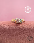 Dainty round lab grown diamond promise ring displayed to show its claw prong setting