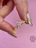 Woman wearing the round pink diamond ring, close-up view on her hand