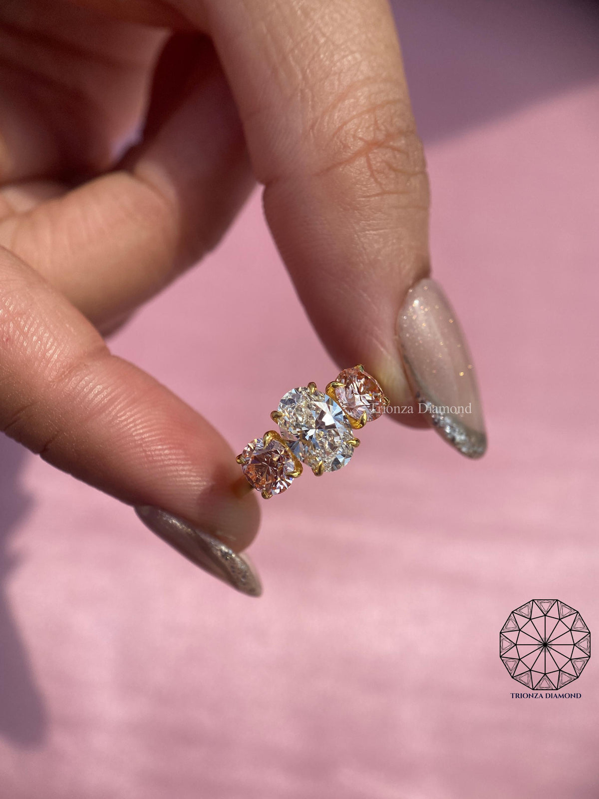IGI certified lab grown oval diamond set in a handmade TrionzaDiamond three stone creation
