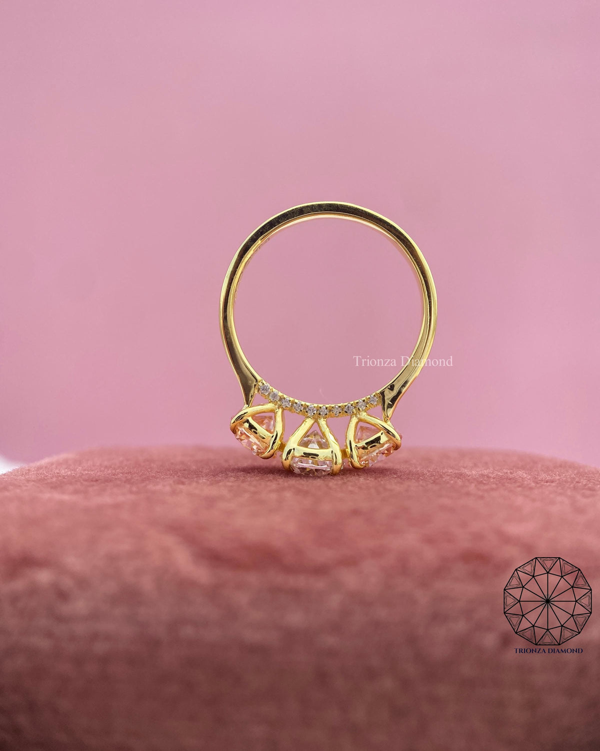 TrionzaDiamond engagement ring crafted with IGI certified lab grown diamonds and pink side stones