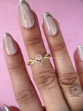 Round cut lab grown diamond ring offering brilliance with a fancy pink color