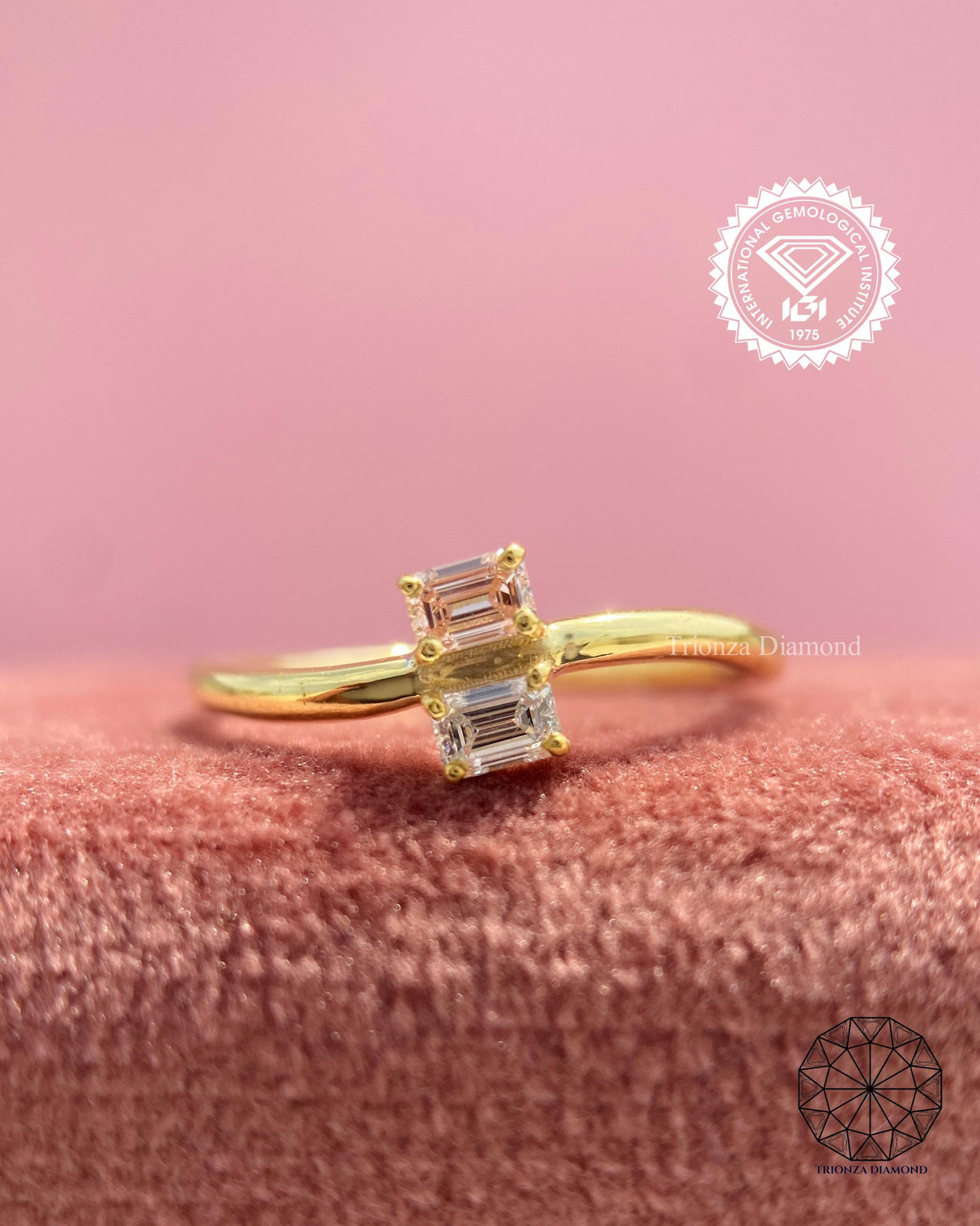 Close-up of the pink emerald cut diamond displaying excellent polish and symmetry