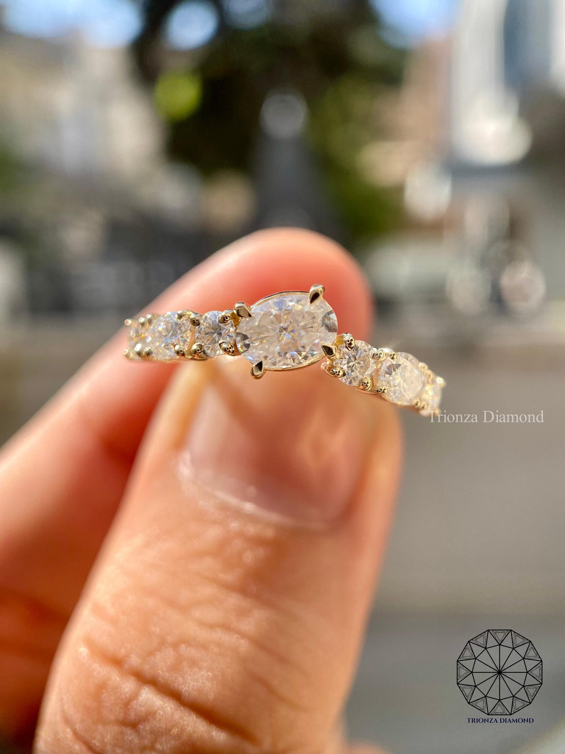 East west stackable oval eternity band featuring lab grown diamonds set in a row