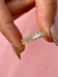 Baguette cut lab grown diamond half eternity band shown in 14K yellow gold setting