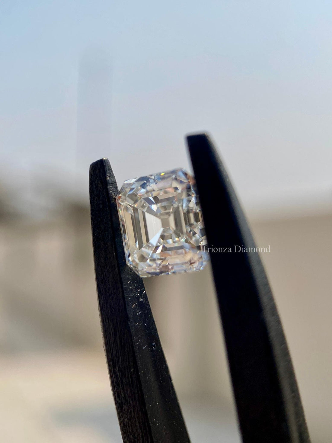 Asscher cut lab grown loose diamond displayed to show its faceted brilliance and clarity
