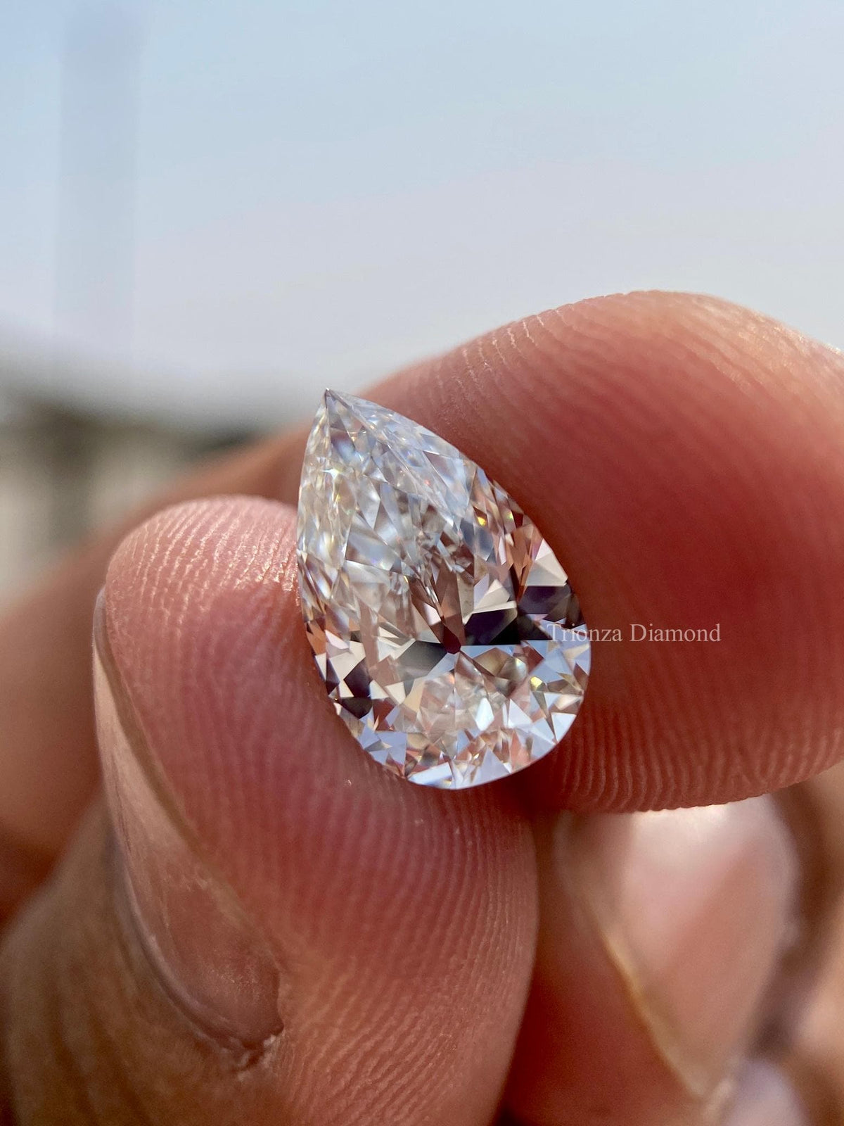 Pear cut lab grown diamond displayed to showcase its brilliance and clean facets