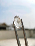 Oval rose cut diamond photographed against a contrasting background to show its brilliance