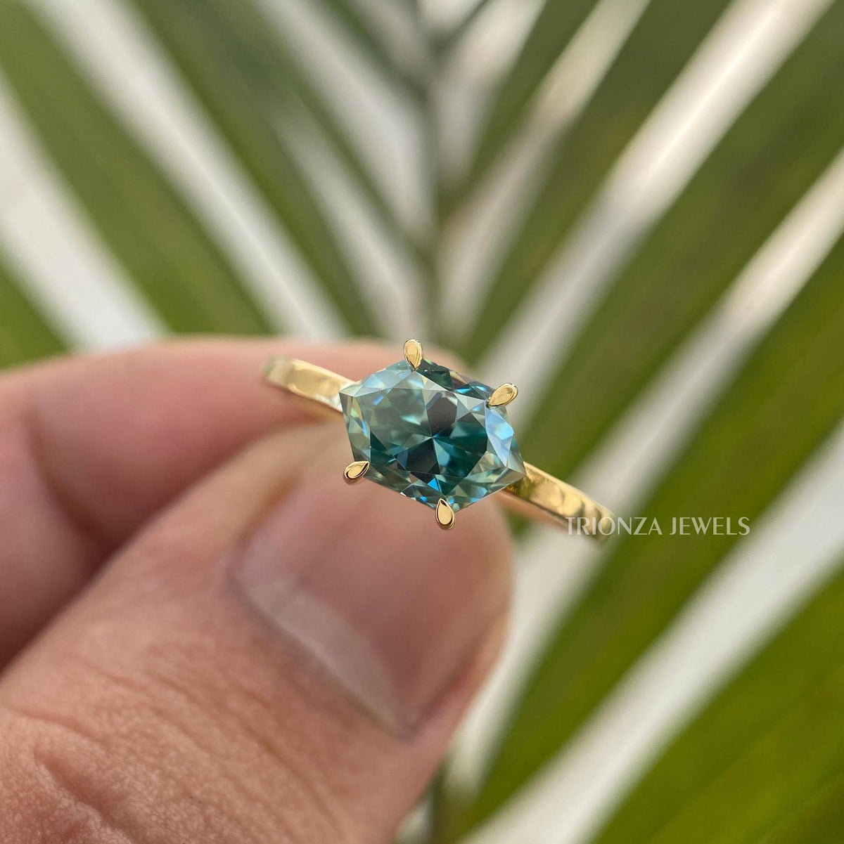 green sapphire engagement ring