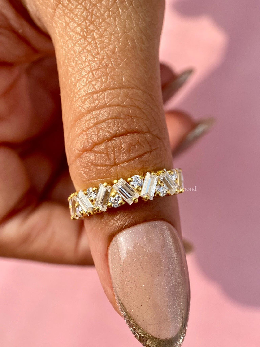 Half eternity wedding band with baguette and round cut lab grown diamonds set in 14K yellow gold