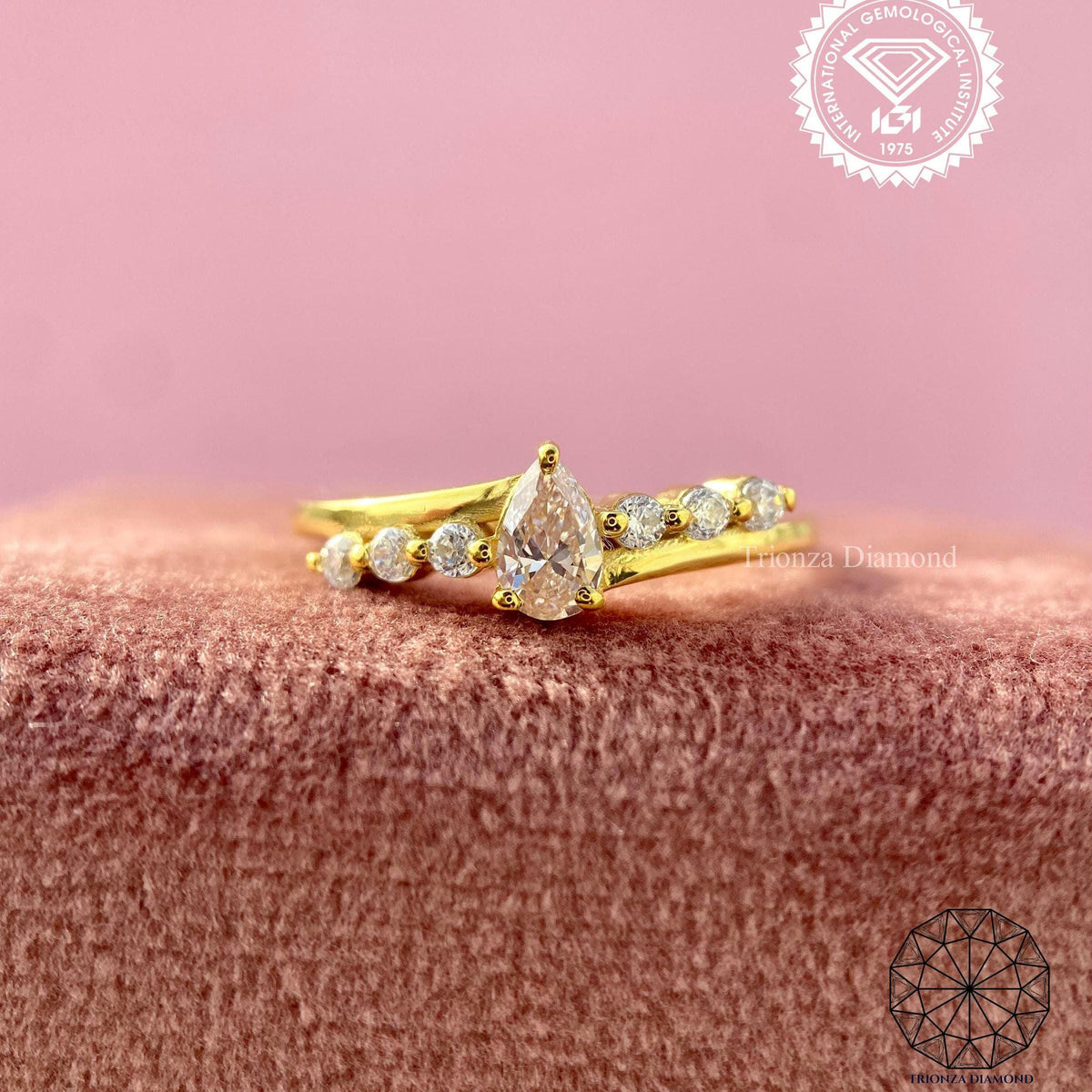 Fancy pink pear diamond engagement ring with a bypass setting crafted in handmade style