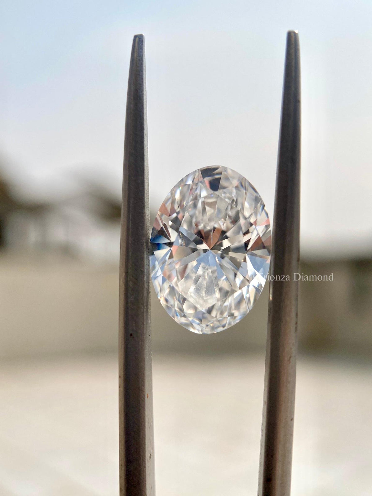 Lab grown diamond shown with measurements for carat weights of 2.00 CT and 3.00 CT