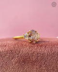 Yellow gold trilogy ring displayed to highlight its modern classic design details