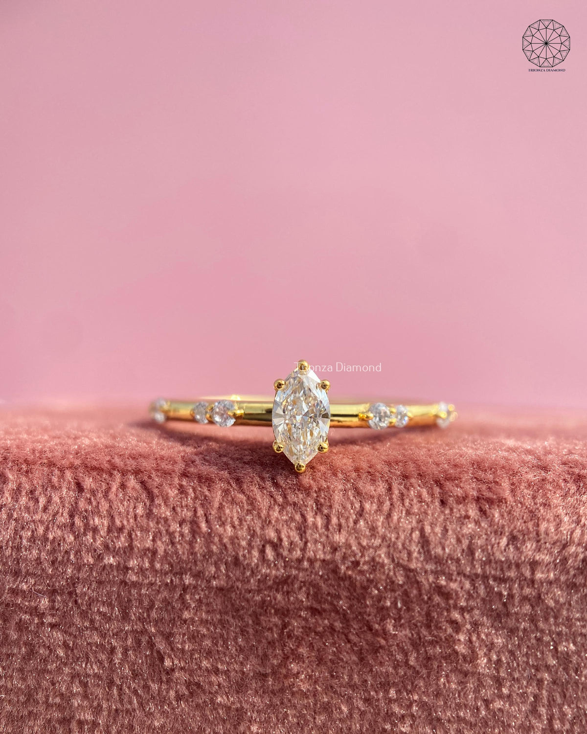 TrionzaDiamond engagement ring crafted with a minimalist marquise solitaire design