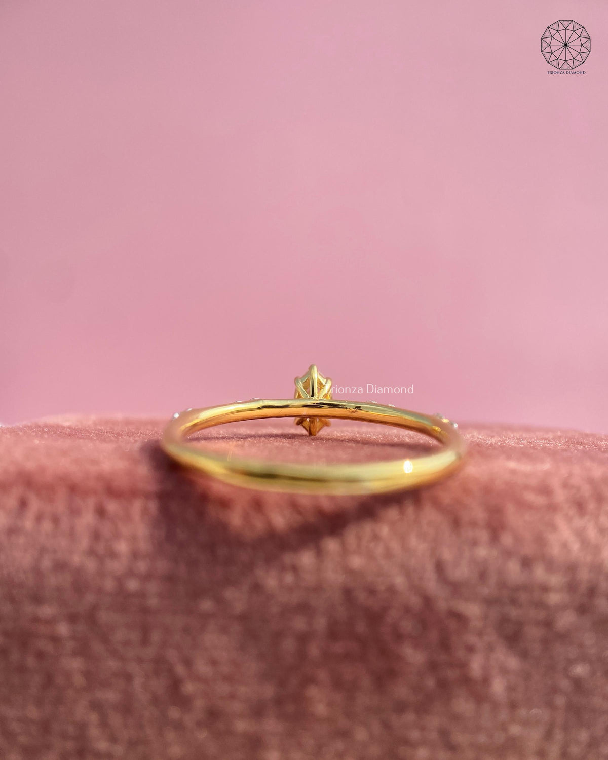 Marquise solitaire ring shown from above, showcasing the 0.22 CT lab grown diamond
