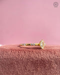 Close-up of the 6-prong double-tip setting securing the marquise solitaire diamond