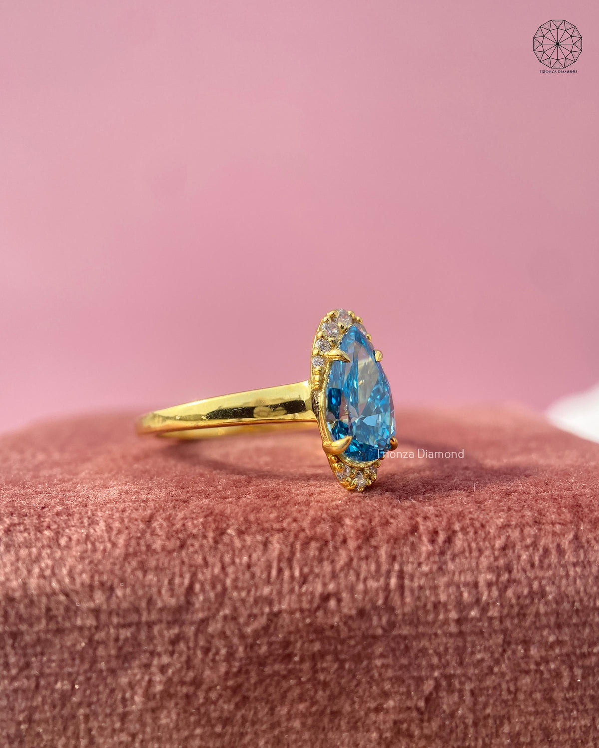 yellow gold pear halo ring