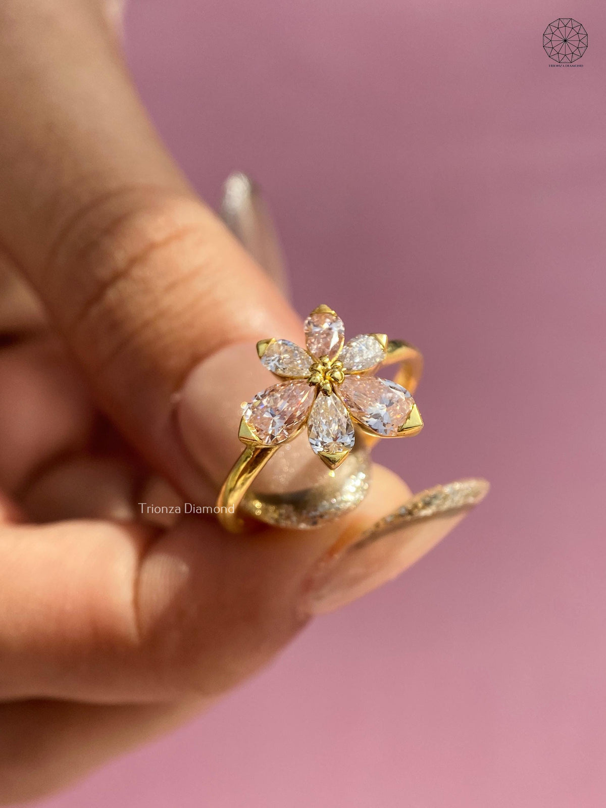 TrionzaDiamond floral ring crafted with pear cut lab grown diamonds for a feminine look