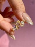 Side view of the animal motif ring highlighting the handcrafted gold detailing