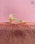 Top down view of the floral cluster ring displaying pear, marquise, and princess cut diamonds