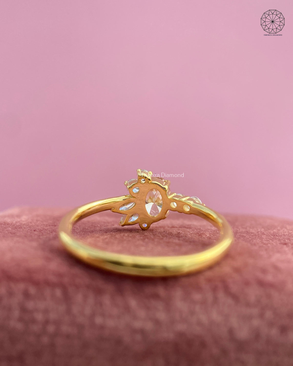 Woman wearing the oval champagne diamond ring, close-up on her hand